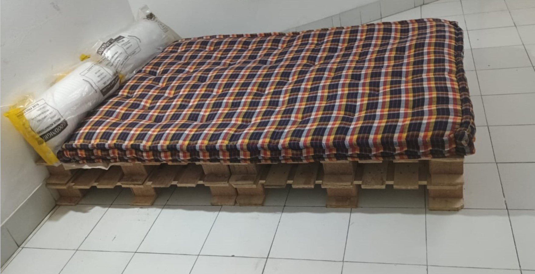 Bed with 4 Wooden Pallets